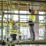 construction-workers-on-scaffolding-e1706456890306.jpg